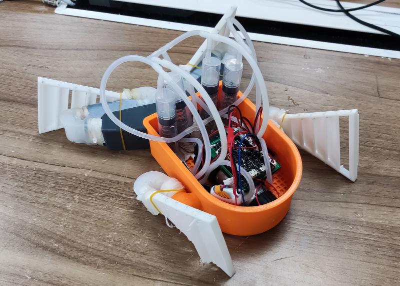 Bionic frog robot prototype — pneumatic soft-body limbs with control electronics